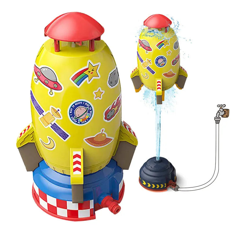 Yellow water pressure rocket launcher toy for kids outdoor garden play on a green lawn.