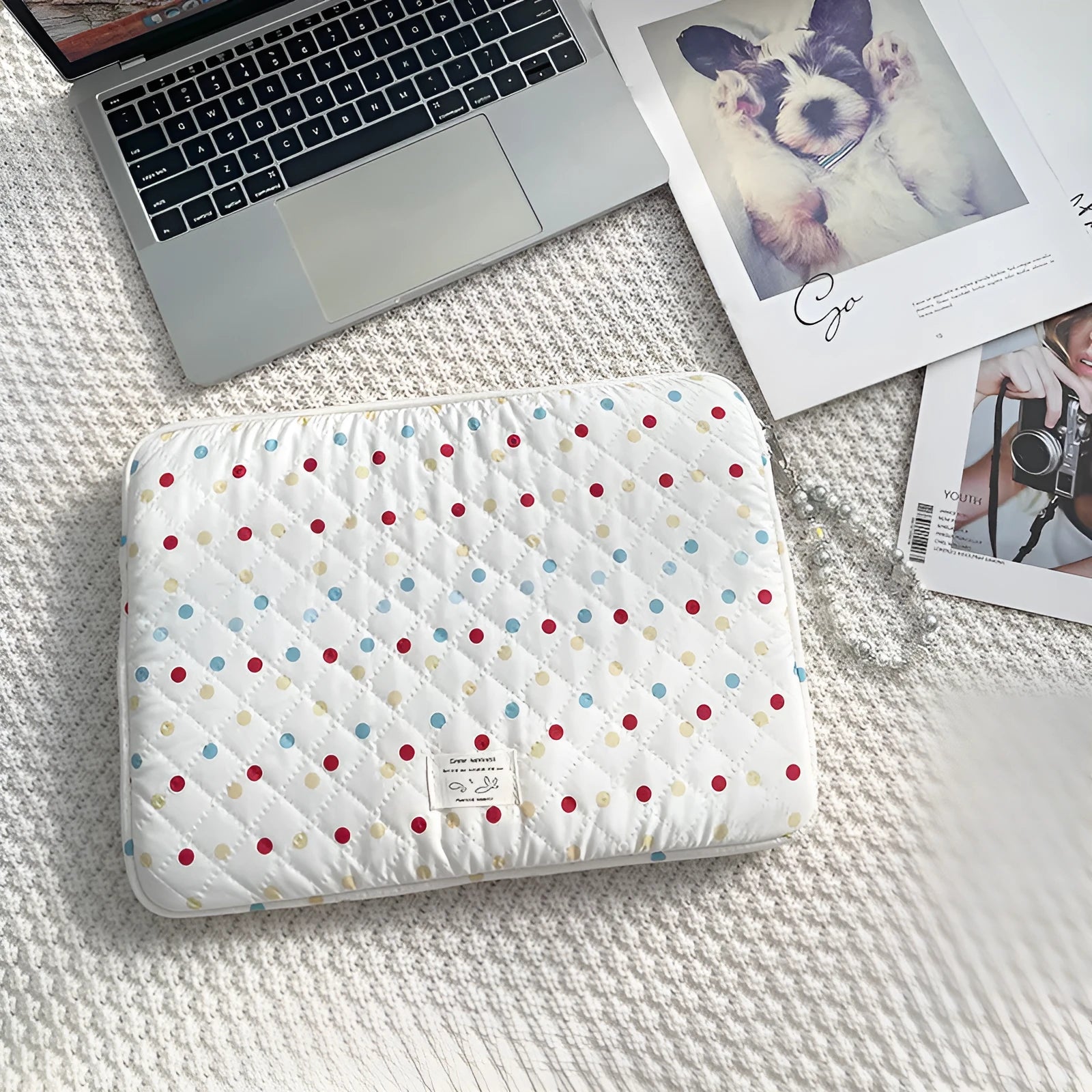 Women's polka dot polyester laptop bag shown in three sizes for 11-inch, 13-inch, and 15-inch laptops.
