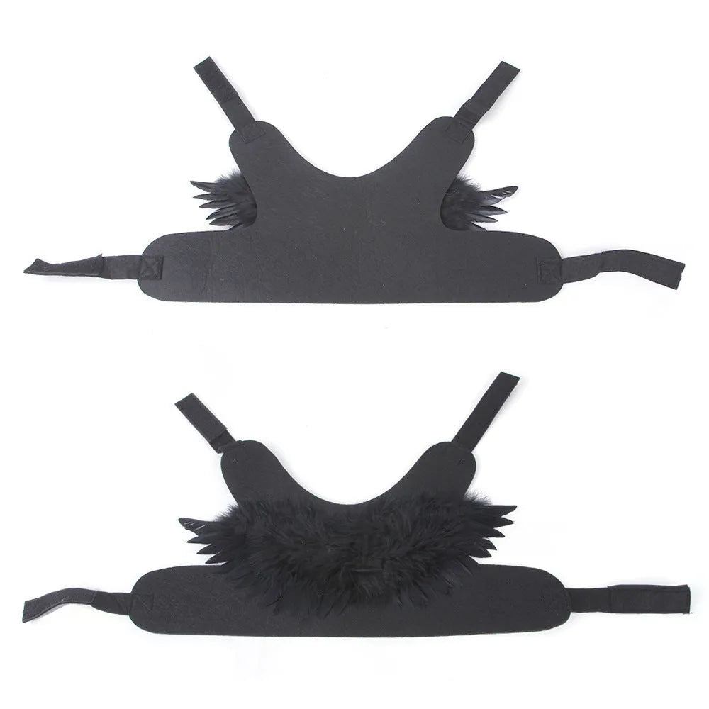 Black and white angel wings costume for dogs on chest and back, with adjustable straps.