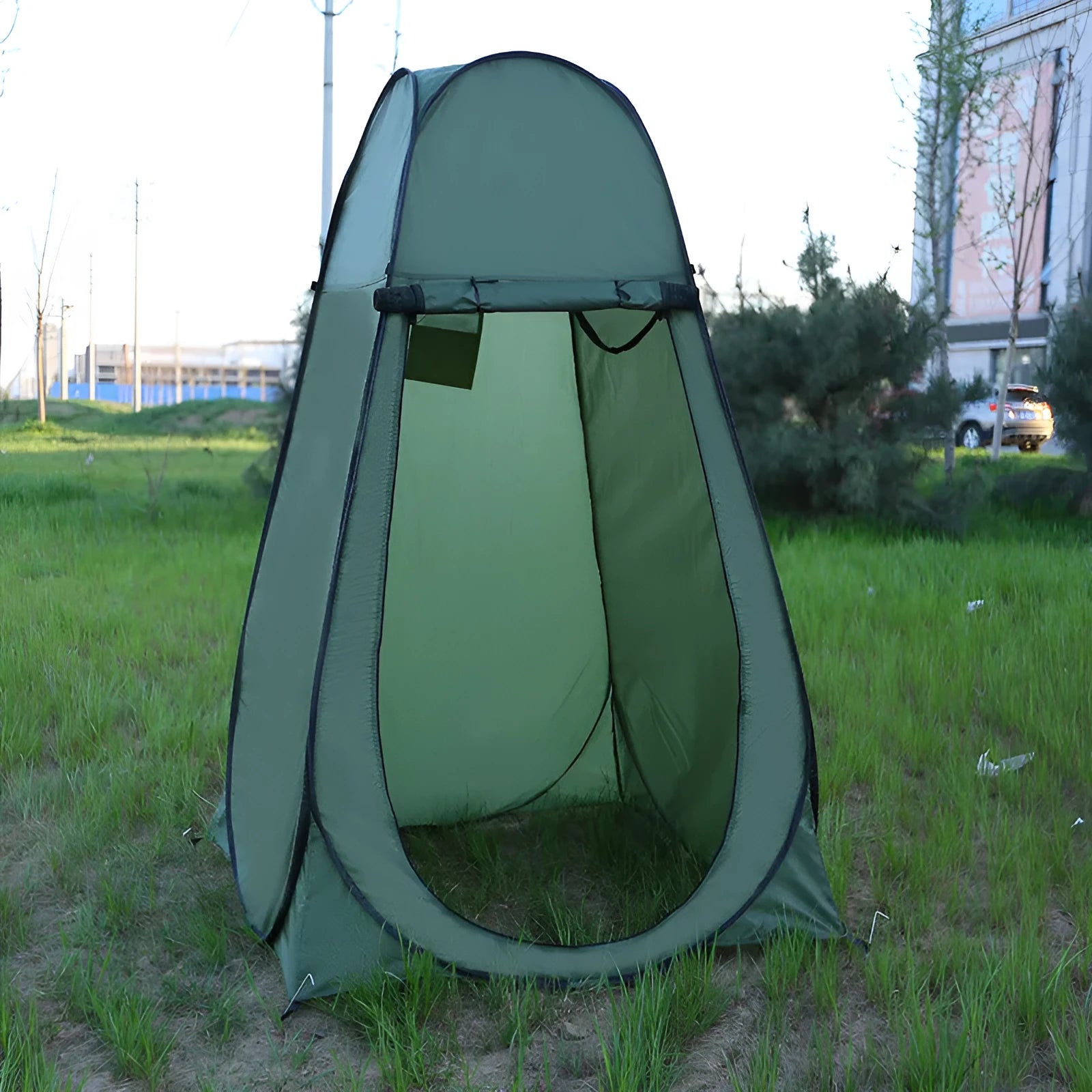 Blue fast-opening outdoor changing tent with storage bag and water bag accessory.