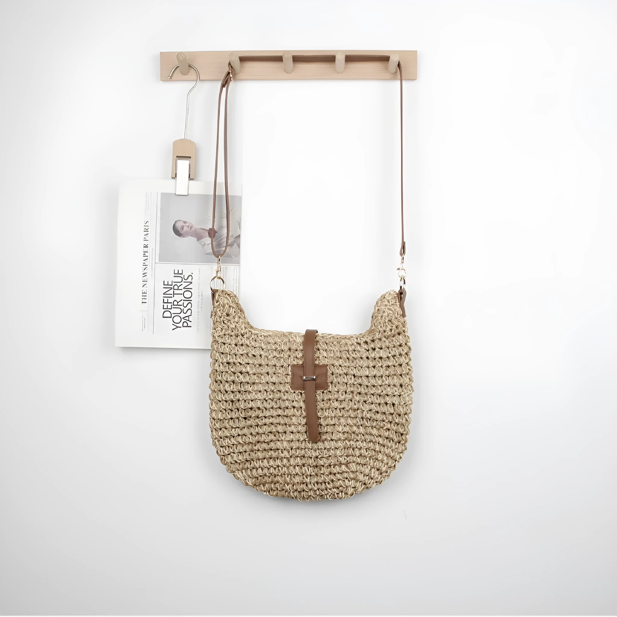 Handmade beige woven shoulder bag with decorative sewing thread details and sandwich pocket