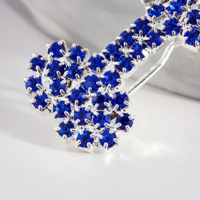 Diamond dog bone pet barrette in size S, shown in white, pink, blue and red for cats and dogs