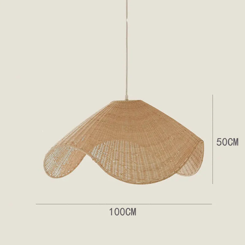 Handmade natural rattan and willow chandelier with warm LED light in three size options.