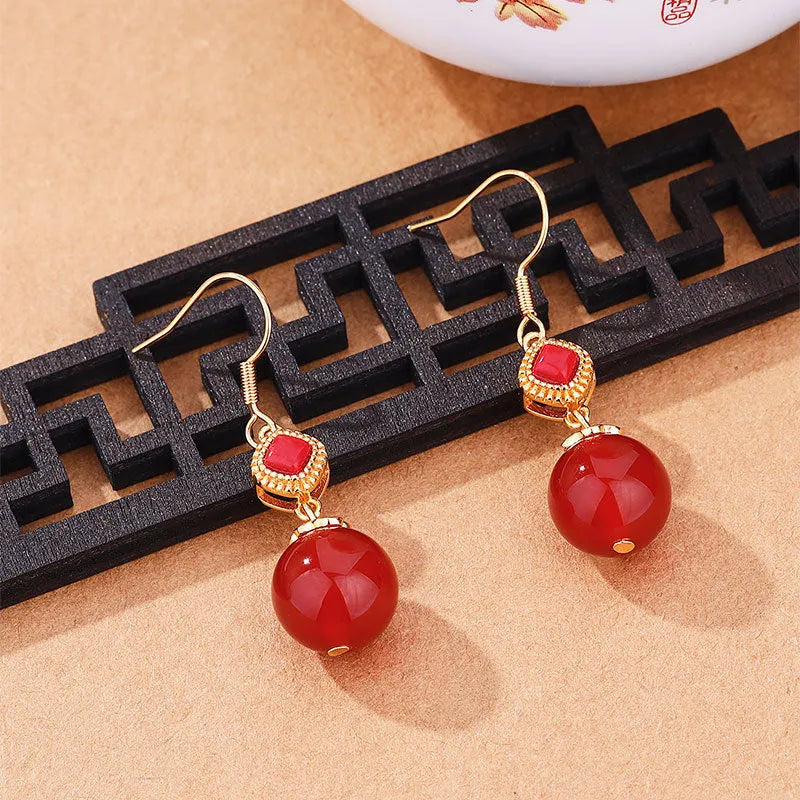 Southern red agate round bead earrings with geometric design and S925 silver inlaid jasper accents