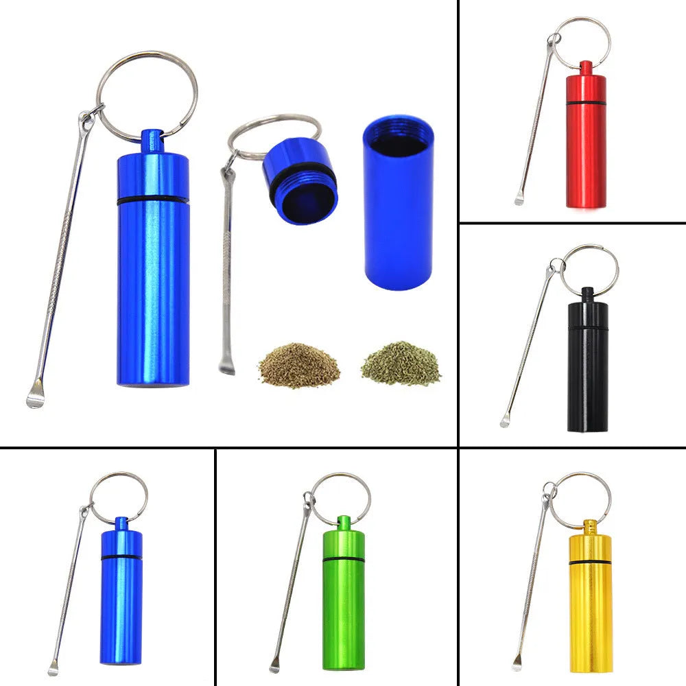 Blue aluminium portable pill box with attached spoon and keychain.