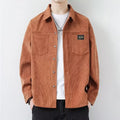 Men's black corduroy cardigan jacket with long sleeves laid flat