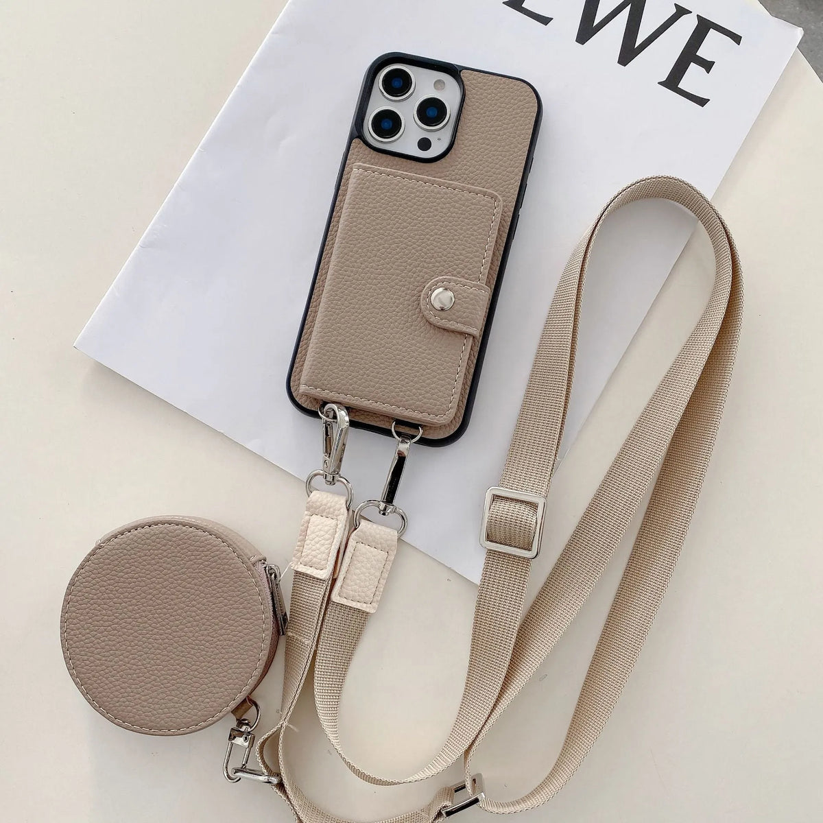Black PC leather card holder phone case for iPhone with lanyard loop and card slots visible.