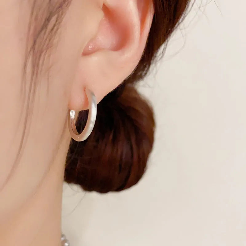 Women's geometric ear clips with round elements in gold and silver colours, real gold-plated copper construction