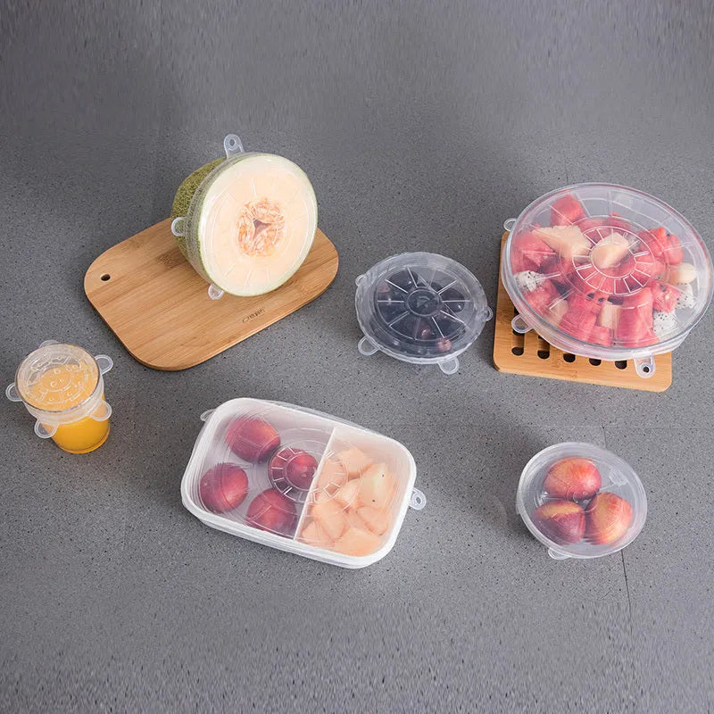 Set of six colourful silicone stretch lids in different sizes for covering food containers.