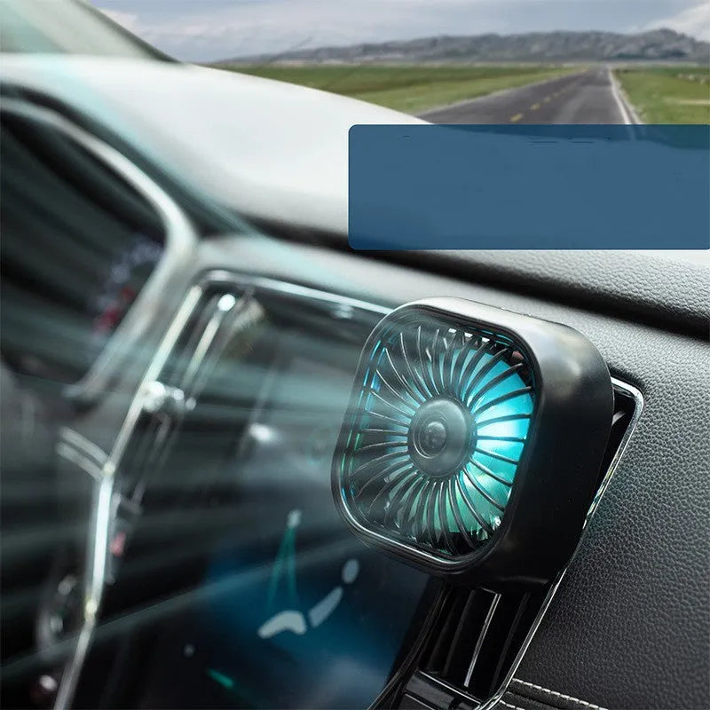 Black car USB fan mounted on vehicle air vent with three speed buttons and USB cable