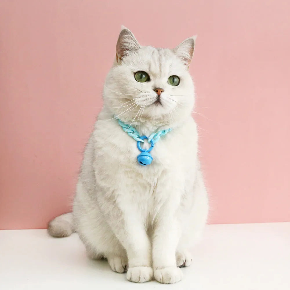 Adjustable pet collar in macaron candy colours with plastic construction and monochrome pattern