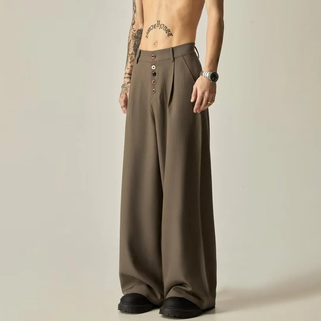 Men's black casual trousers with elastic waistband and straight-leg design on hanger