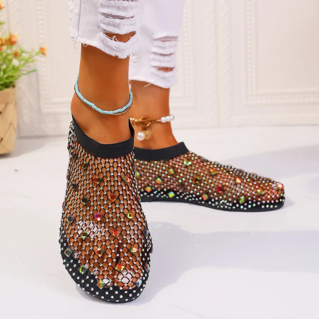 Women's mesh flat sandals with colourful rhinestone design on round toe, showing rubber sole and breathable upper