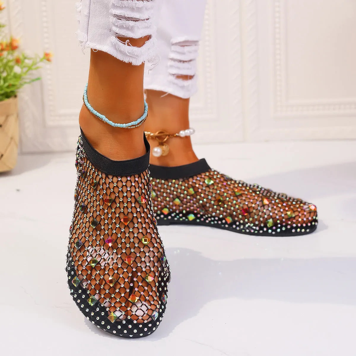 Women's mesh flat sandals with colourful rhinestone design on round toe, showing rubber sole and breathable upper