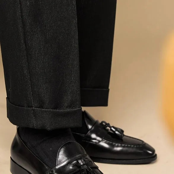 British-style tassel loafers in polished leather with rubber sole and pigskin lining