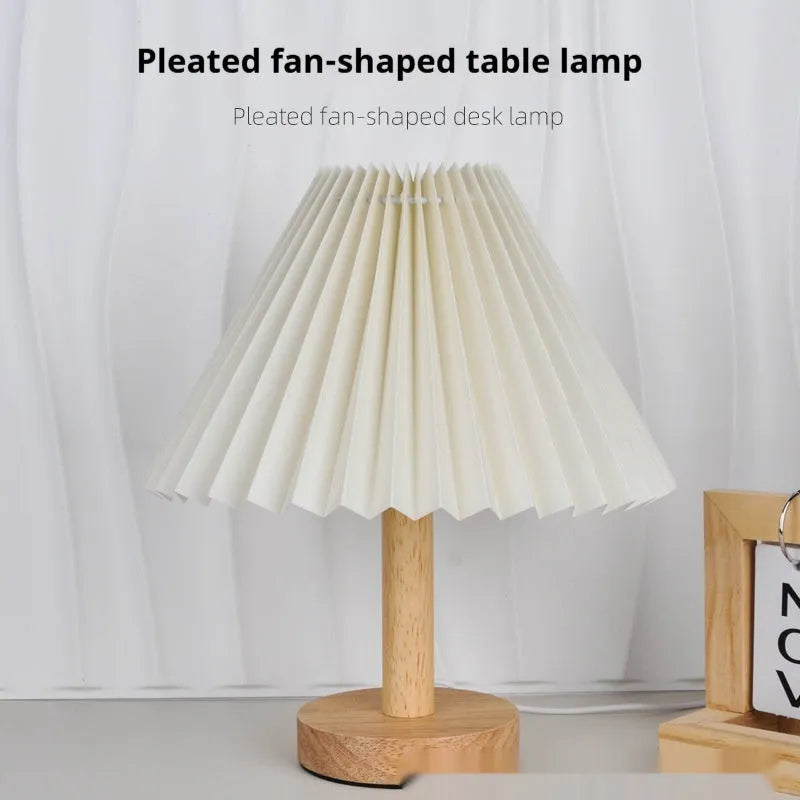 Vintage pleated umbrella-shaped bedside lamp with remote control on bedside table