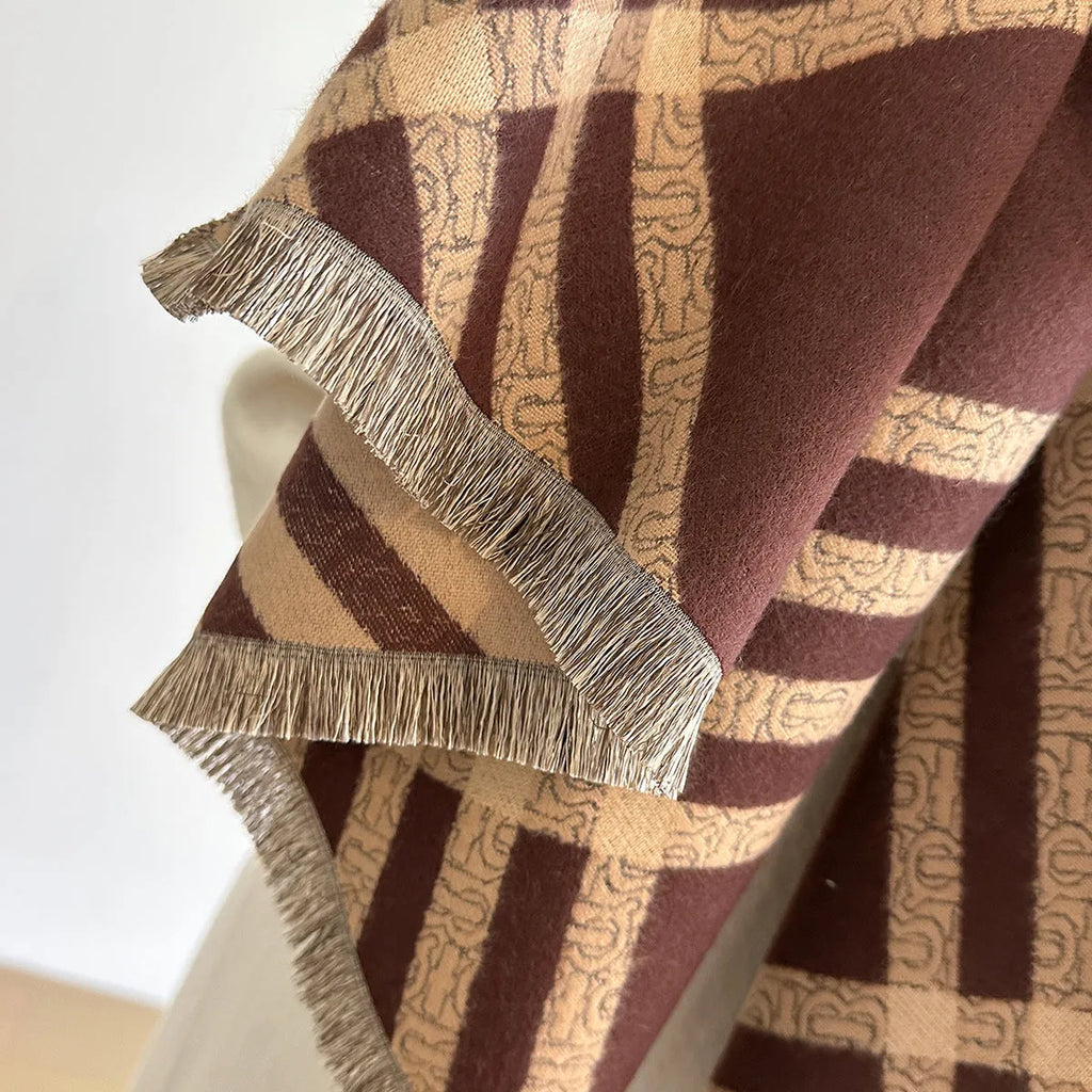Cashmere-like scarf with tassel detailing in brown colour, showing 185x65cm dimensions