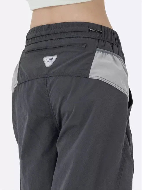 Fleece-lined quick-dry paratrooper cargo pants in army green with cargo pockets and adjustable ankle cuffs.