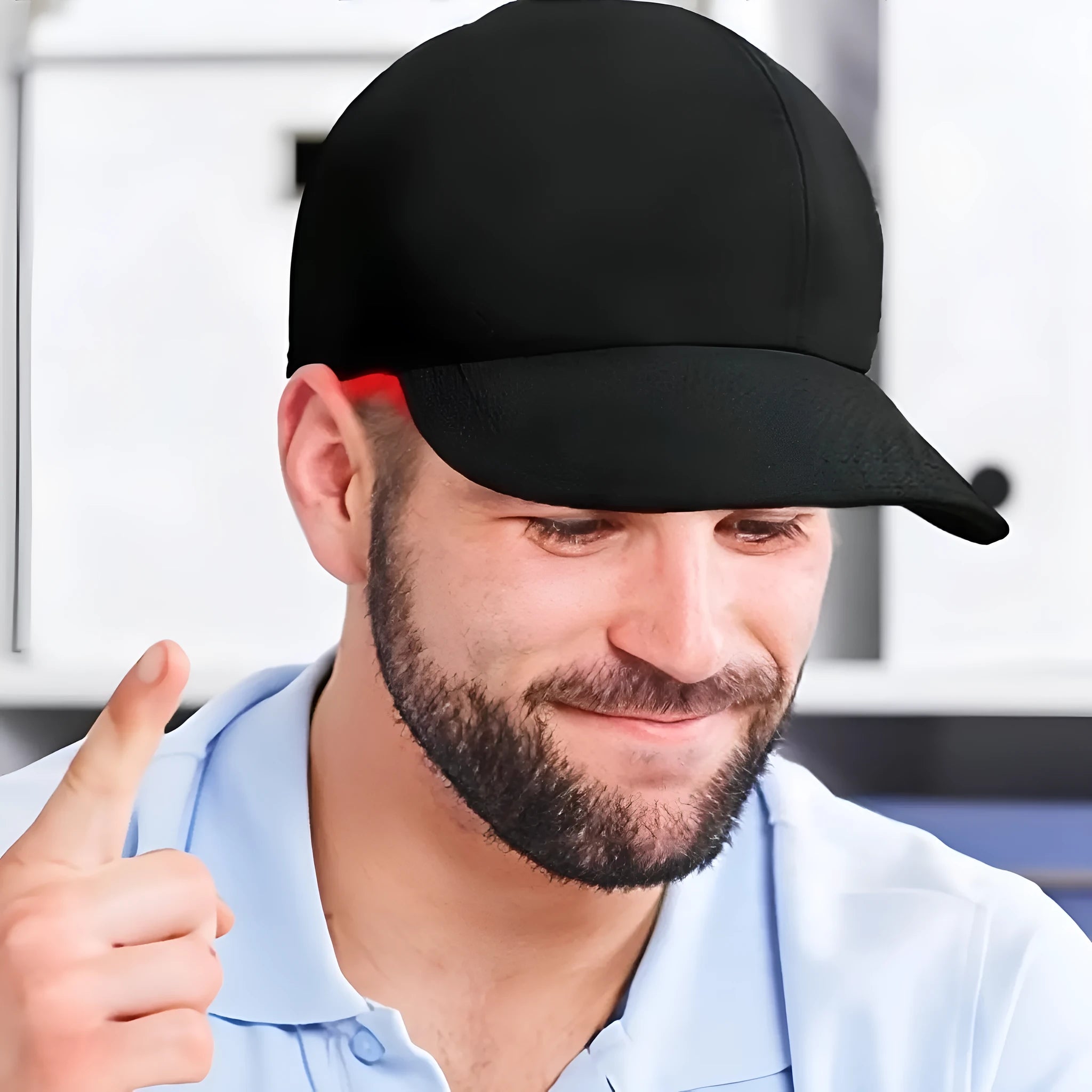 Black infrared peaked cap with 180 LED red lights for hair growth therapy, includes controller
