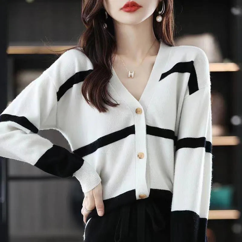Women's V-neck cardigan with 3D striped pattern in slim fit, available in black/white, green, camel, and black apricot colours