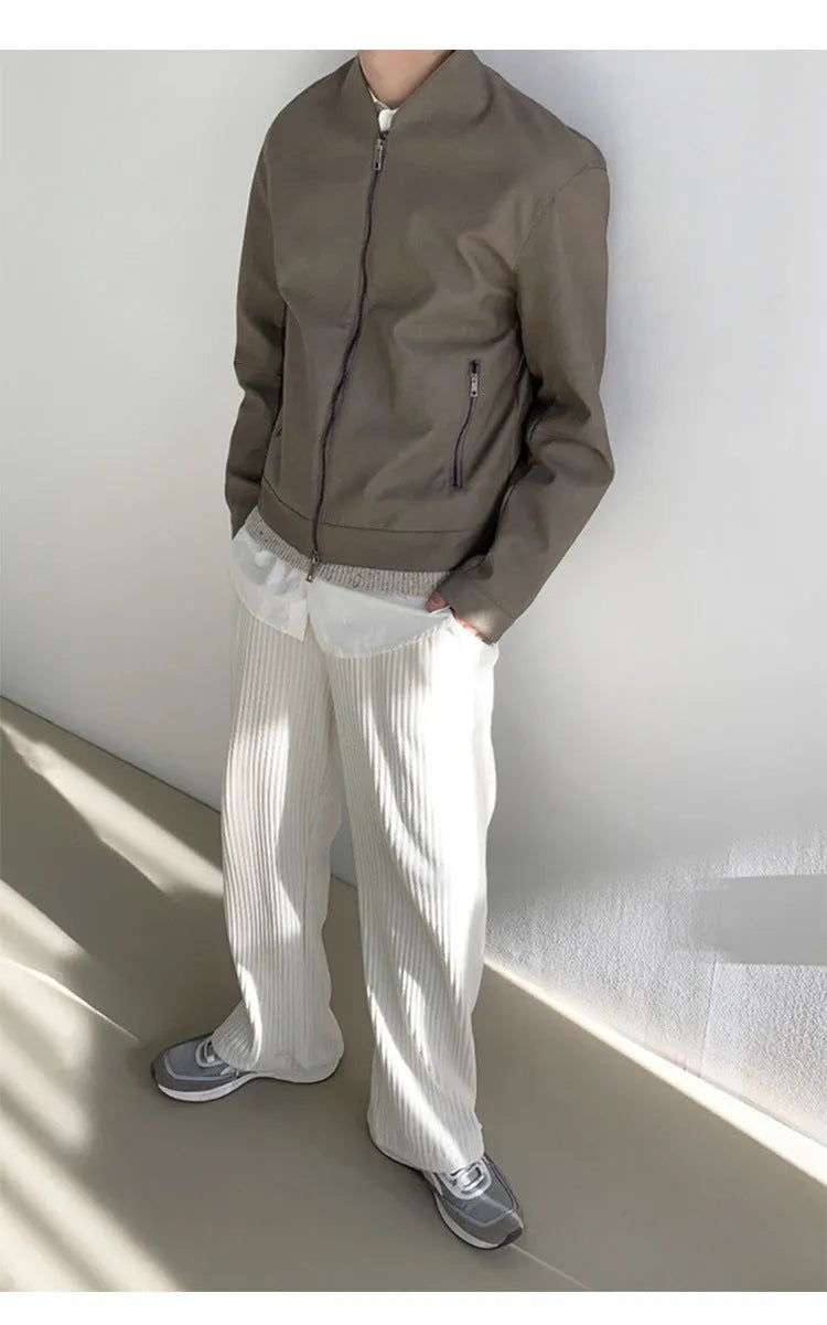 Men's loose corduroy casual pants in solid colour with high waist, drawstring no-fly closure and ankle-tied cuffs.