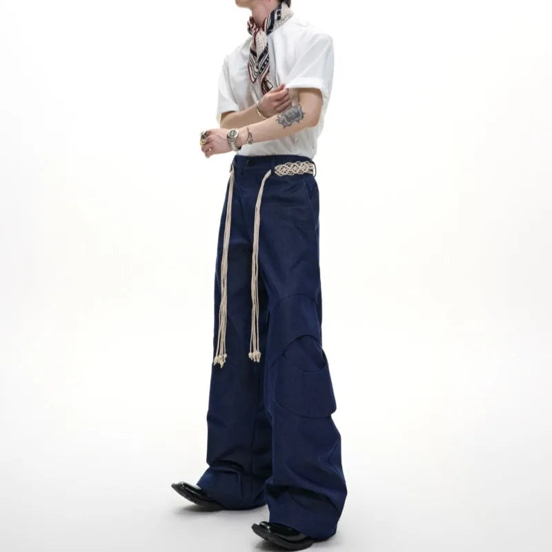 Men's cotton straight-leg trousers with micro-elastic fabric, zipper decorations, and tassel details in dark colour options