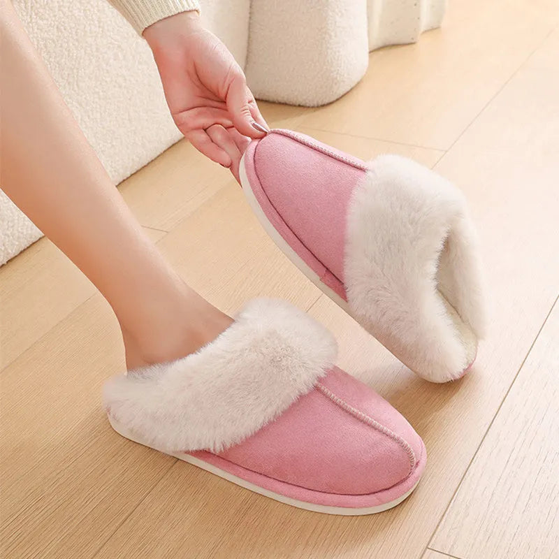 Women's brown plush indoor slippers with round toe, flat heel, and anti-slip PVC sole.