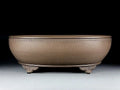 Handmade oval purple sand flowerpot measuring 50x39.5x16cm for desktop or ground plant placement