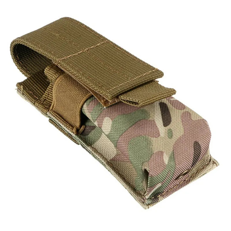 Outdoor military waistbag in black with MOLLE straps, holding a small flashlight and pistol cartridges