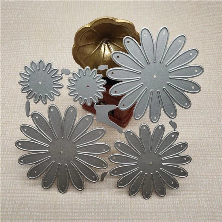 Silver floral design metal cutting die with hanging hook, 12.5cm by 13cm.