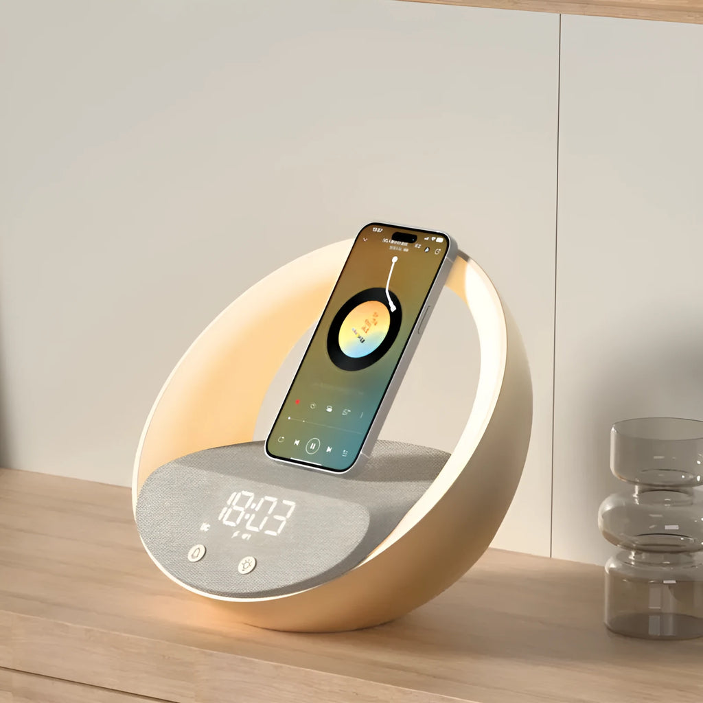 Beige multifunctional wireless charger clock with digital display, fabric speaker grille, and LED wake-up light on a wooden surface.