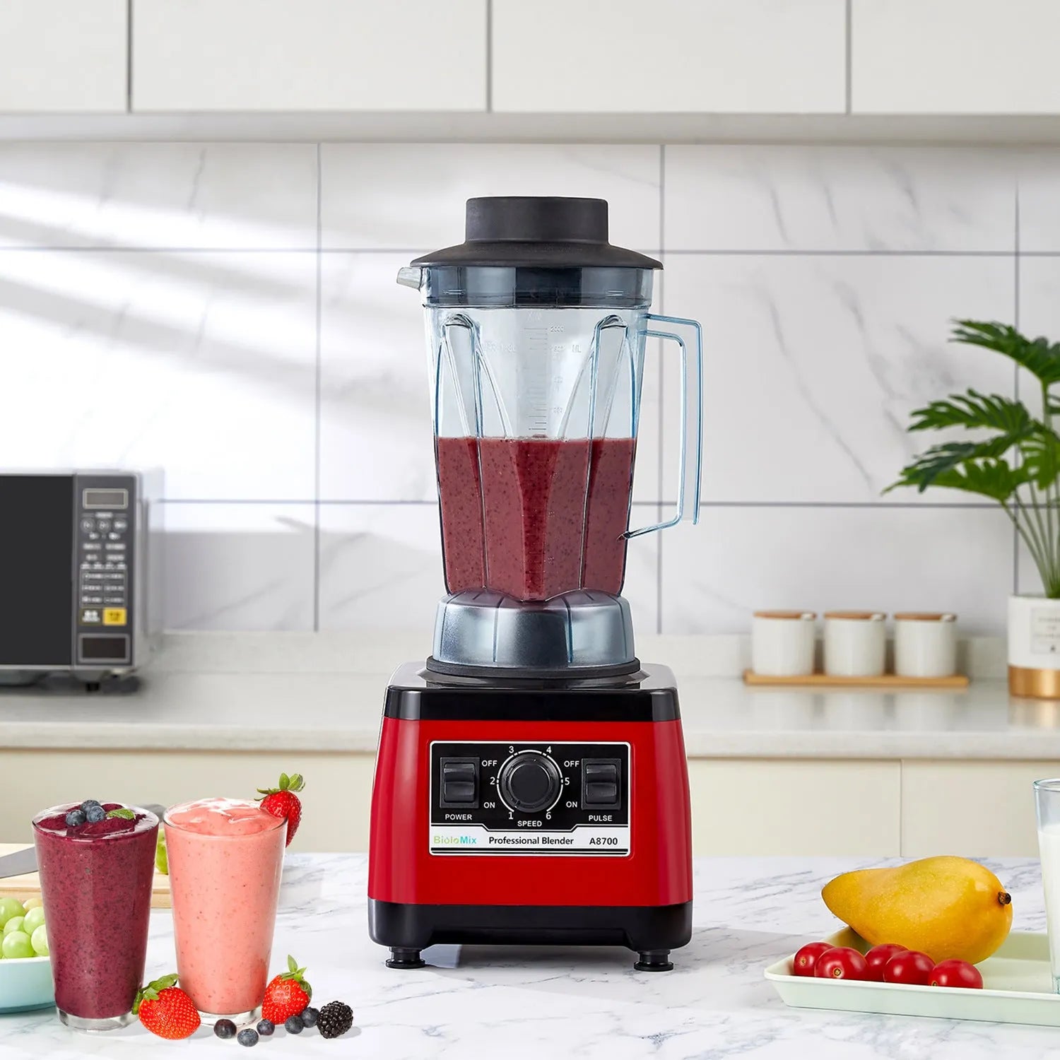 Red commercial blender with 2200W motor and 2L capacity for industrial kitchen use