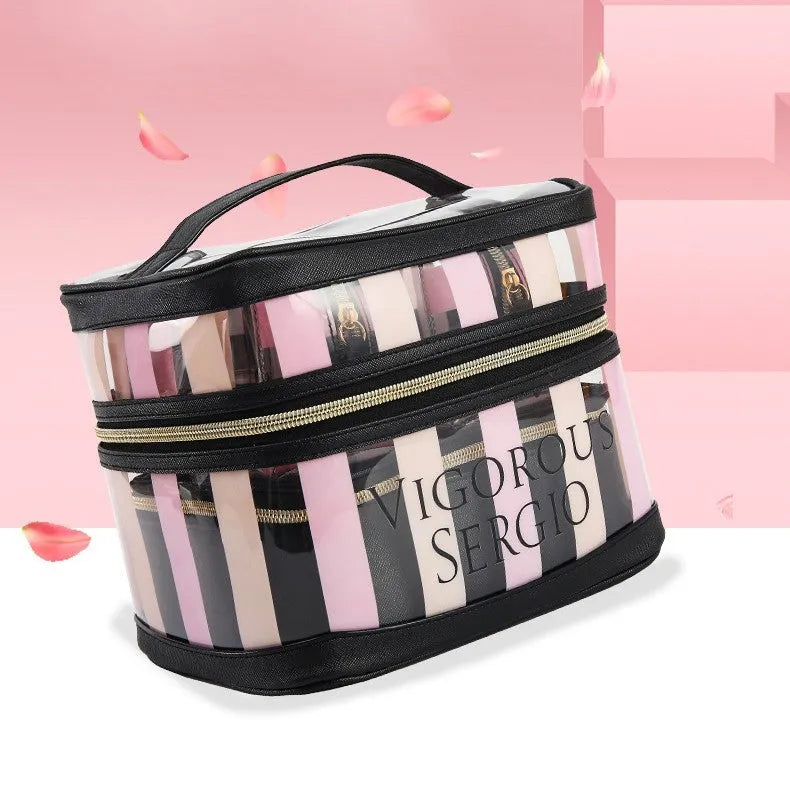 Pink bold stripes floral pattern folding makeup kit with three compartments open showing nylon lining