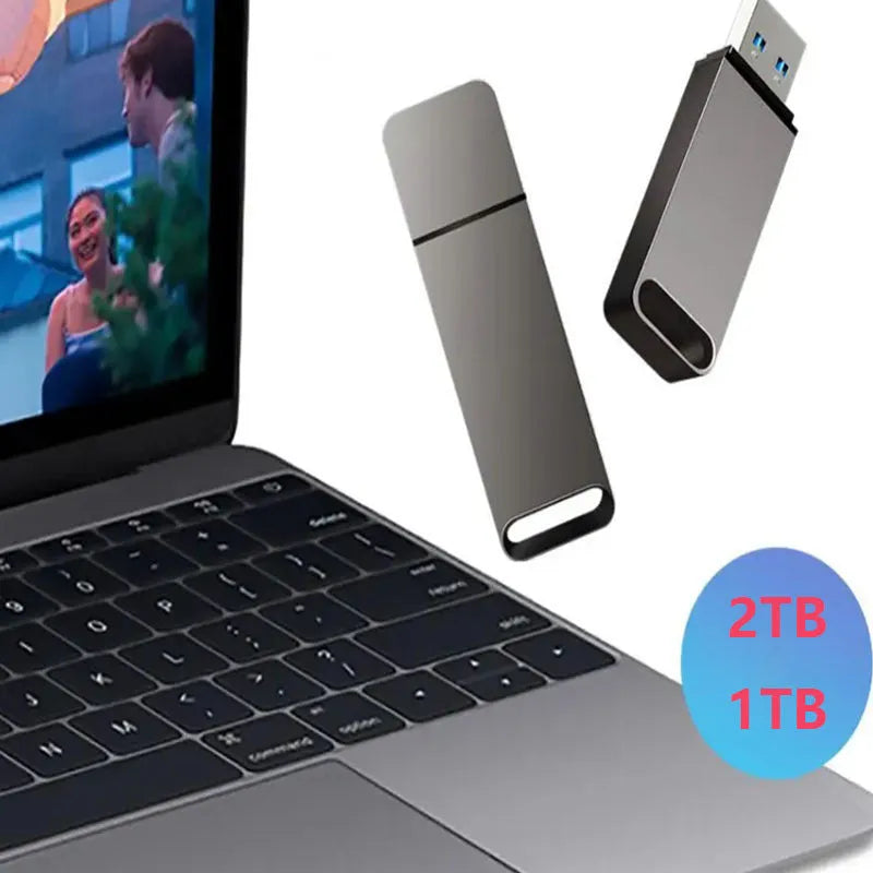 Black metal USB flash drive with custom graphic, showing 16TB capacity and compact size for portable storage