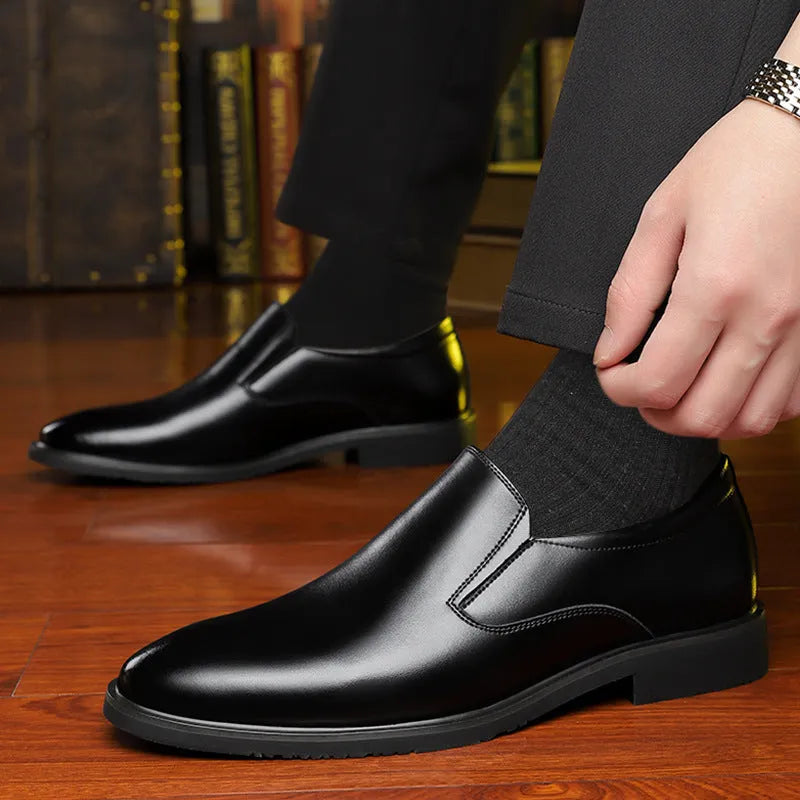 Men's black leather business casual slip-on loafers with leather toe cap and rubber sole