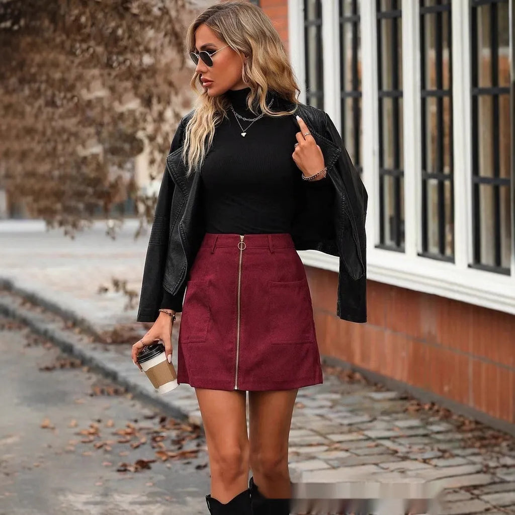 High waist stitching zipper short skirt for women in black, camel, brick red, or dark green polyester fabric, hip skirt design with short length