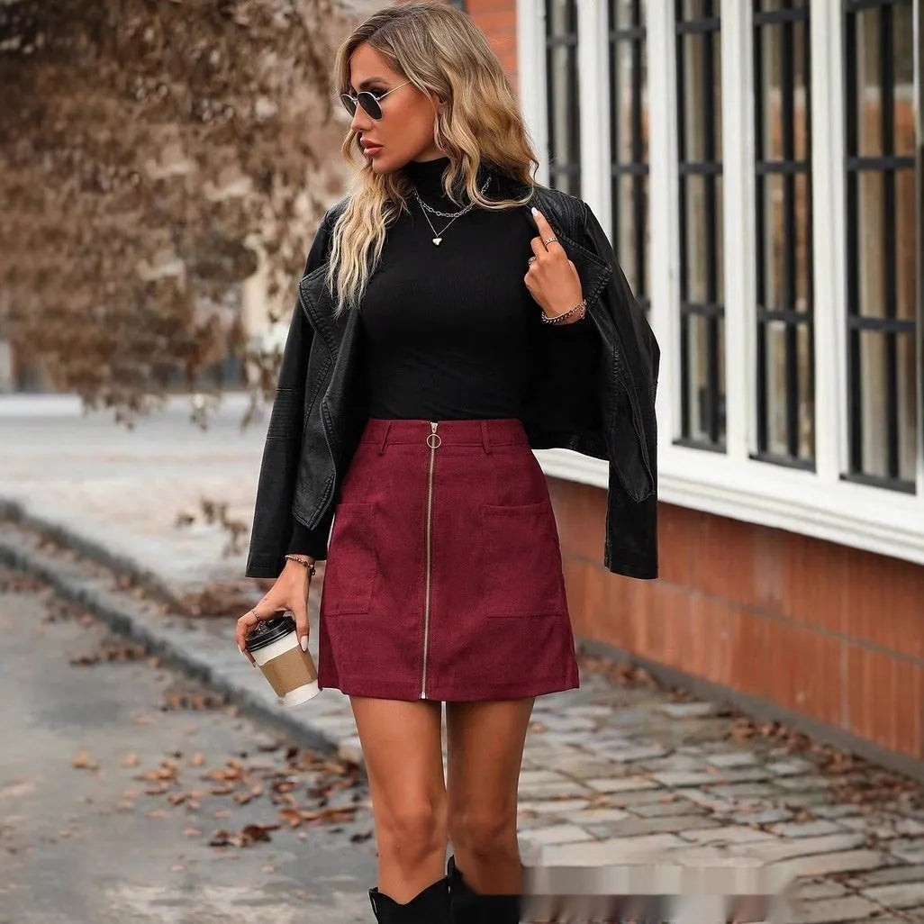 High waist stitching zipper short skirt for women in black, camel, brick red, or dark green polyester fabric, hip skirt design with short length
