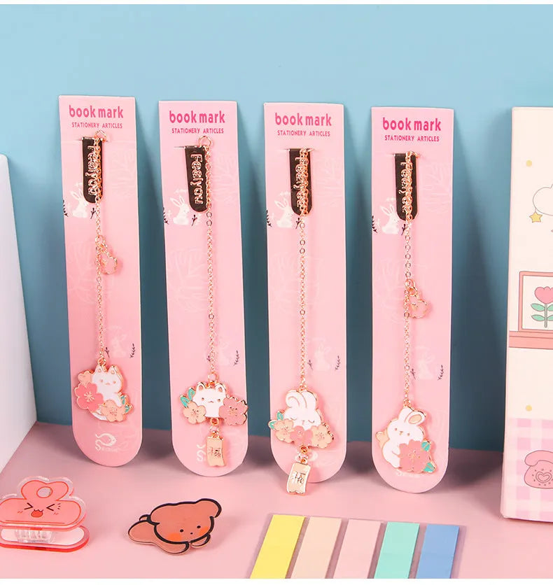 Creative cartoon metal pendant book holder with cherry blossom cat design for journal decoration.