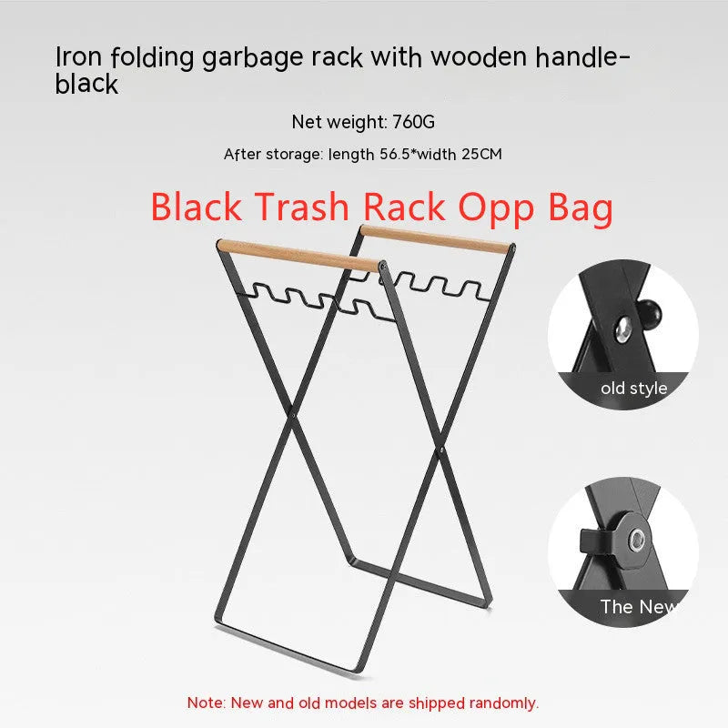 Black folding iron trash rack with wood handle holding bin bag outdoors