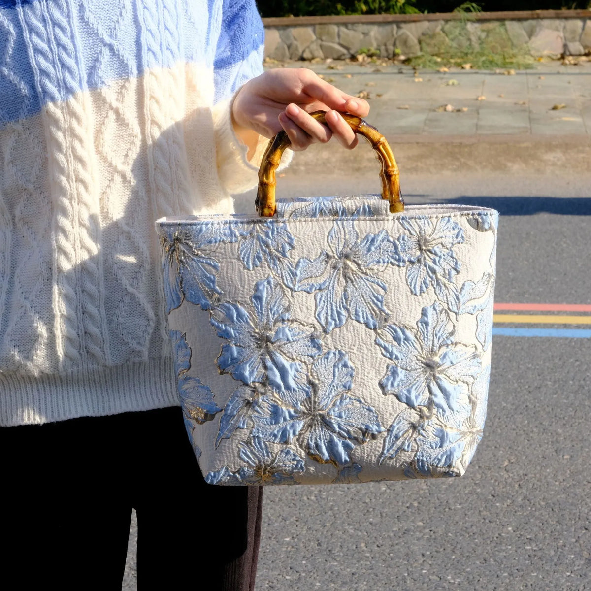 Light blue canvas shoulder bag with bronzing flower pattern and double adjustable straps