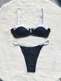 Black women's low waist bikini swimsuit with stitching split detail on brief style