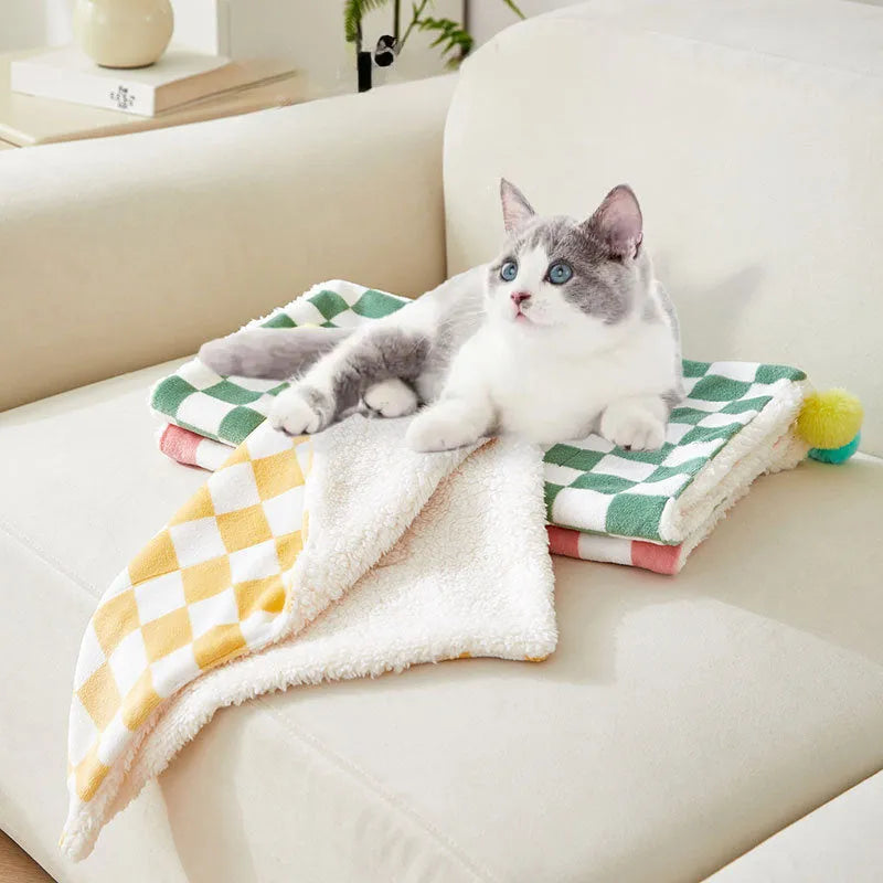 Green plaid pattern soft fleece pet blanket with fur ball decoration for cats and dogs