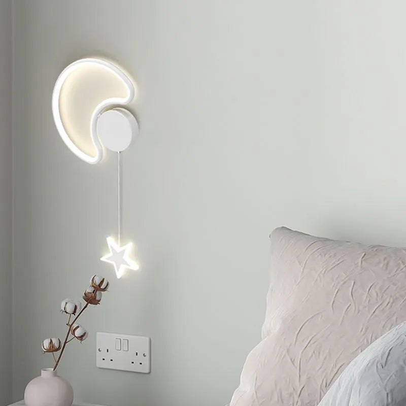 Five-pointed star shaped children's bedside wall lamp with cloud and star motifs in black finish