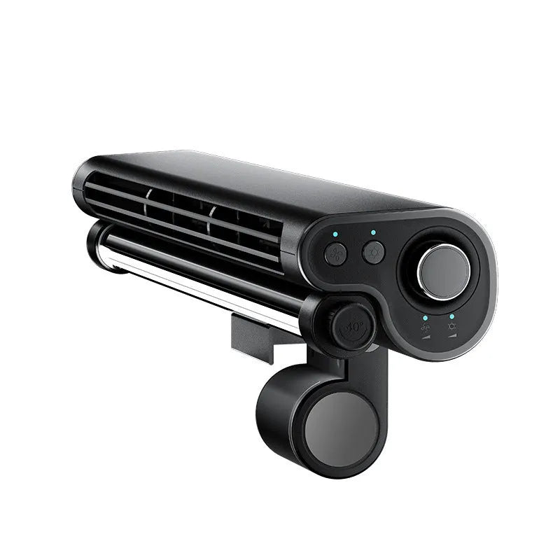 Black bladeless fan with lighting lamp attached to laptop screen showing USB connection and screen clamping mechanism