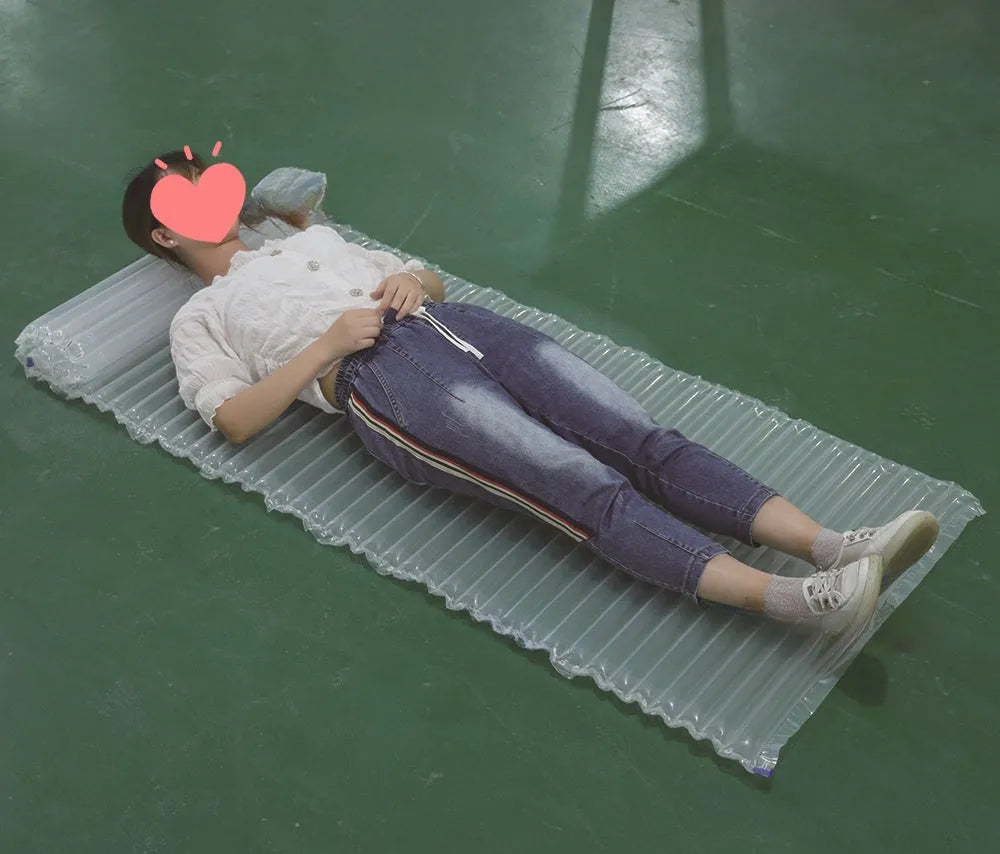 Transparent inflatable camping airbed showing dimensions and sturdy construction.