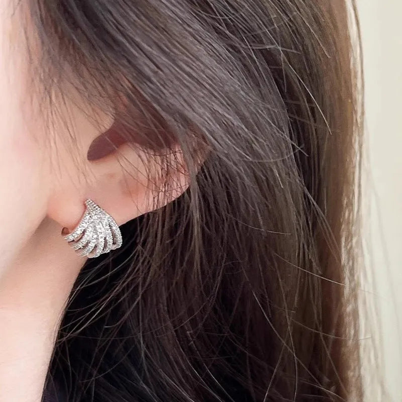 Geometric line design earrings with platinum finish and zircon material for women