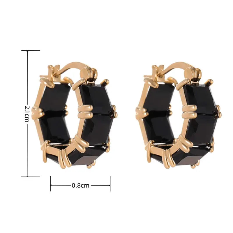 Geometric U-shaped zircon ear rings with electroplated gold finish on copper construction