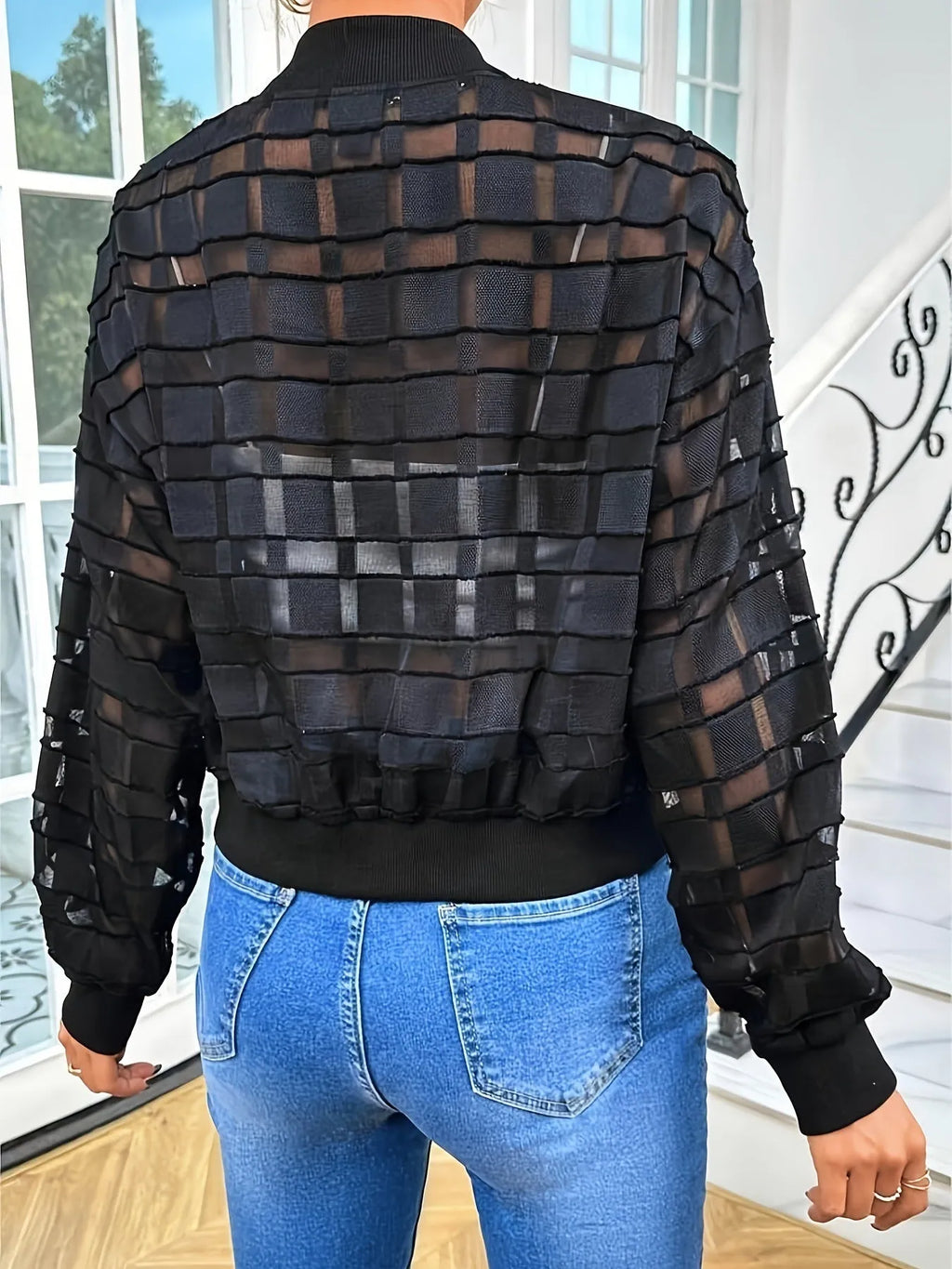 Black women's semi-transparent jacket with geometric pattern, zipper, and long sleeves for casual wear