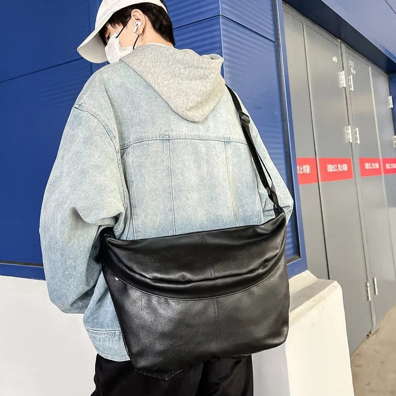Brown retro-style men's crossbody bag showing front view with dimensions 50x29x3cm