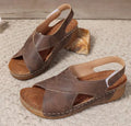 Women's brown Roman platform sandals with an ankle skirt and Velcro strap
